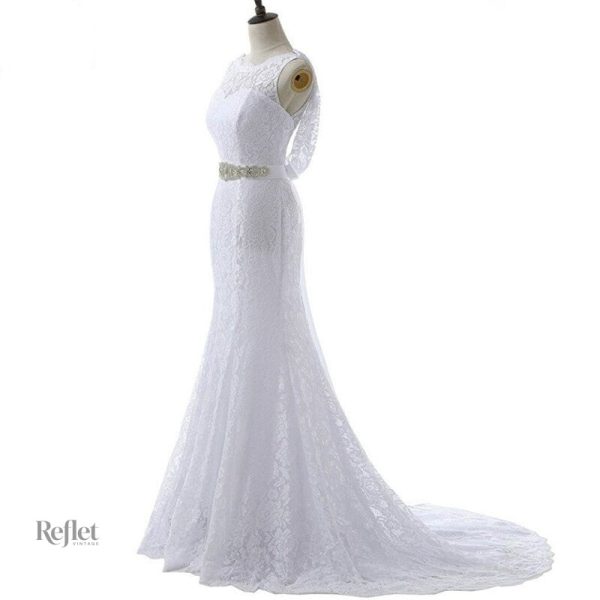 Robe de mariée avec jupe volumineuse et délicates broderies