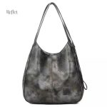 Sac à main en cuir vintage, mêlant chic et praticité