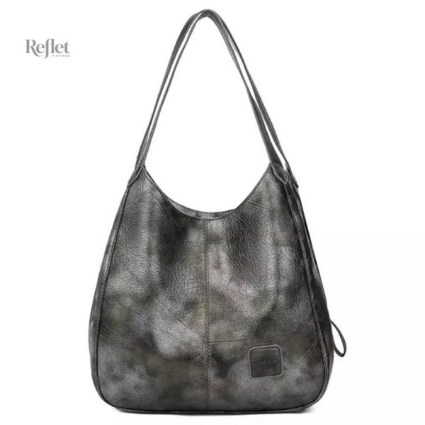 Sac à main en cuir vintage, mêlant chic et praticité
