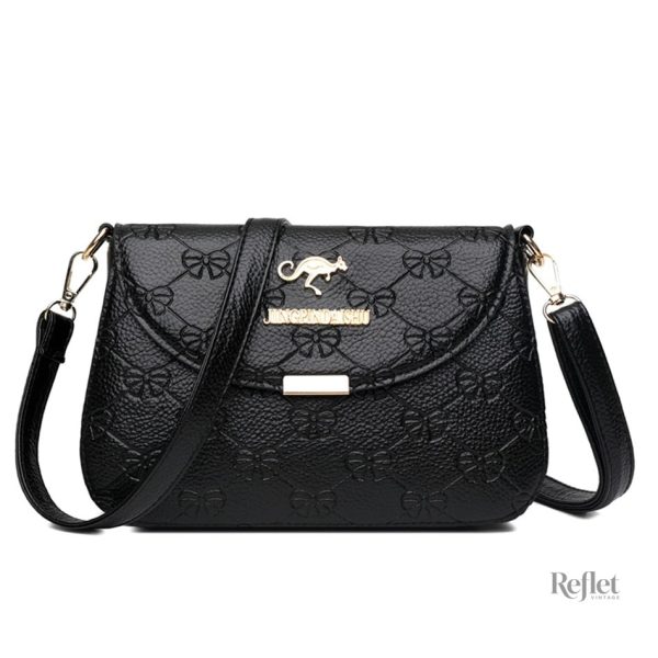 Sac rigide en cuir au style rétro, parfait pour un look chic