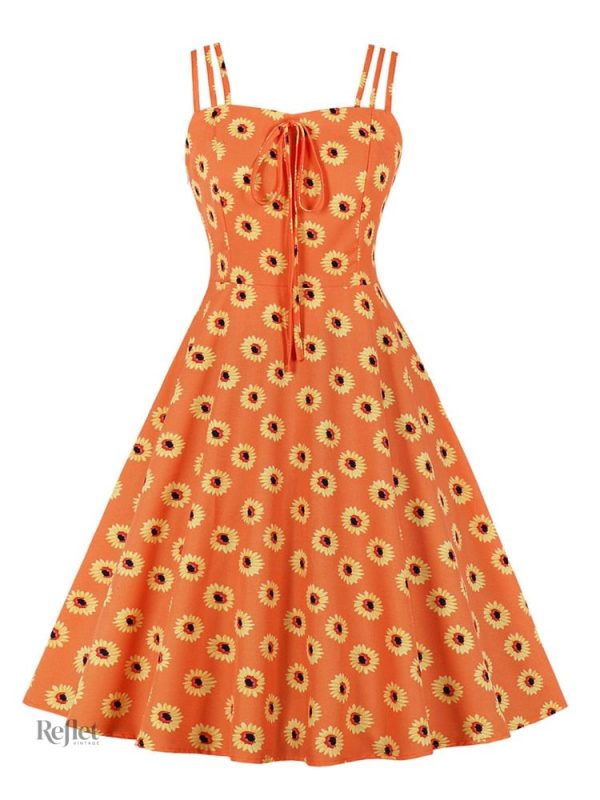 Robe féminine au charme des années 30, parfaite pour les occasions spéciales