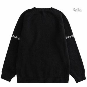 Pull vintage femme avec col en V et manches contrastantes